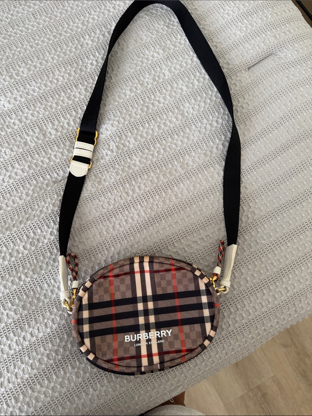 Burberry Beige Plaid Oval Crossbody with Black Strap and Red Accents